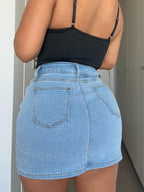 Falda short brillos celeste